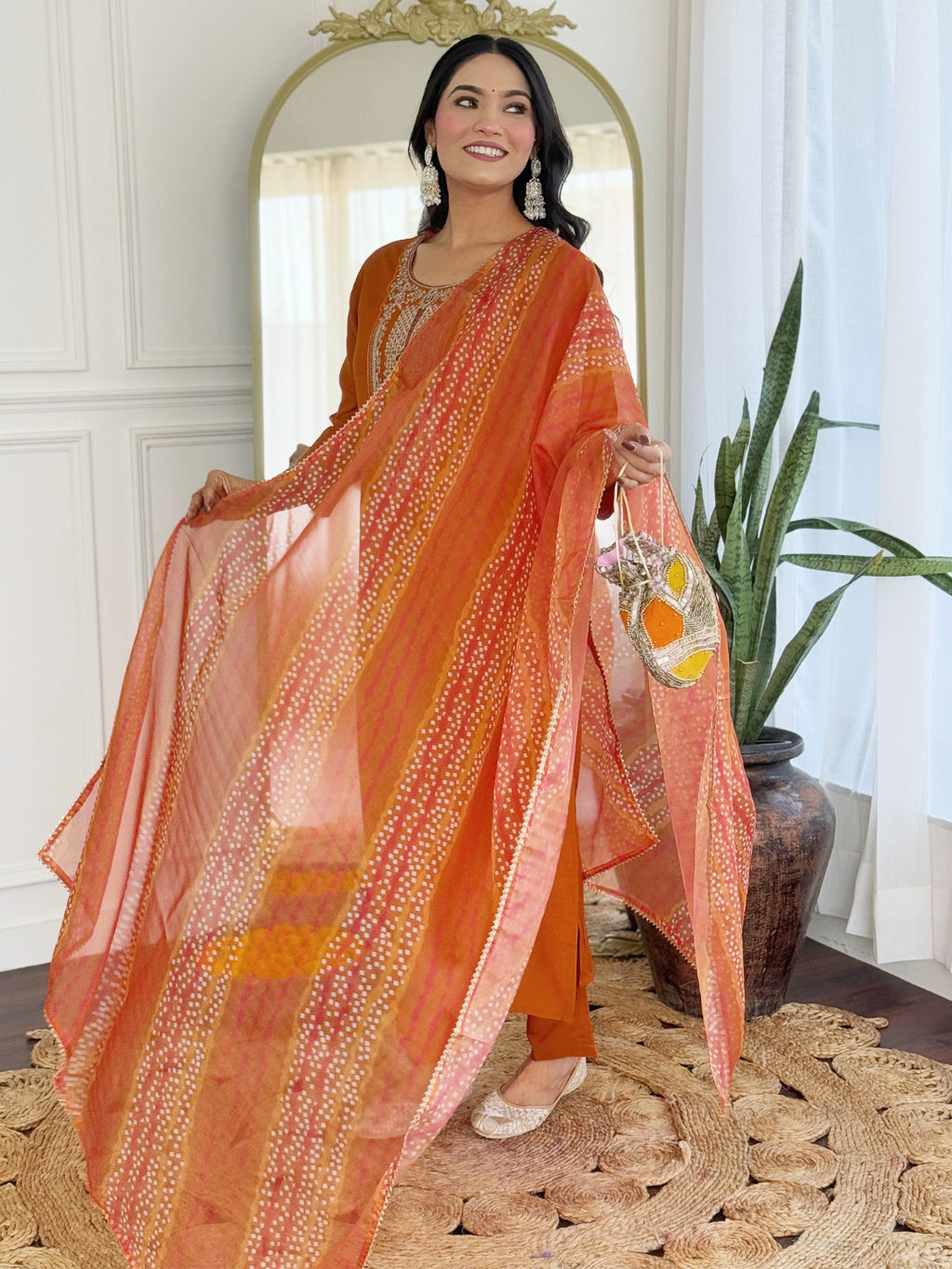 Women's Rust Rayon Embroidered Straight Kurta with Rayon Pant And Taby Printed Dupatta Sets