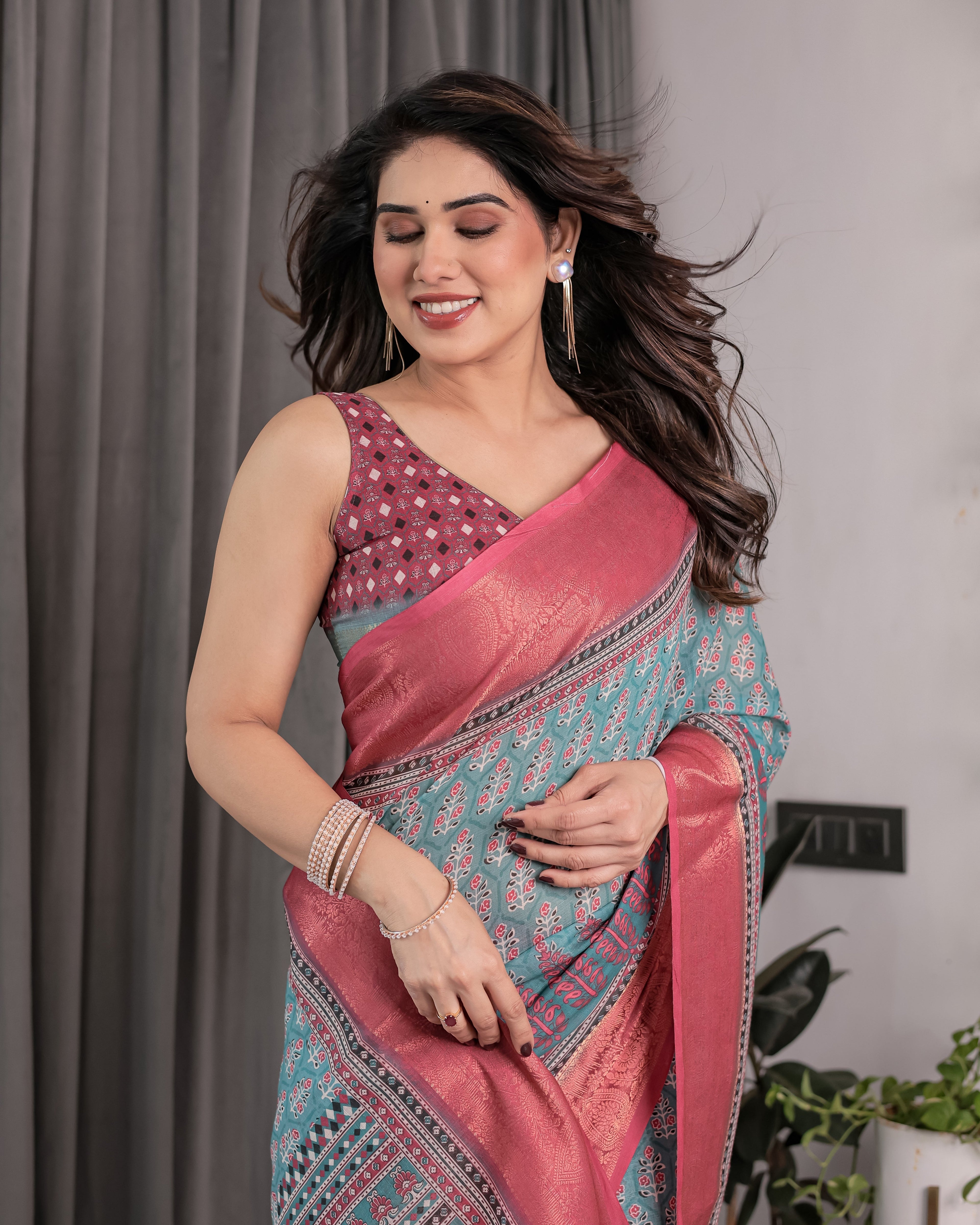 Teal Blue & Rani Pink Handloom Linen Saree with Ethnic Floral Print, Zari Border & Rich Pallu | Tassel Finish | 5.5m Saree + 0.8m Blouse