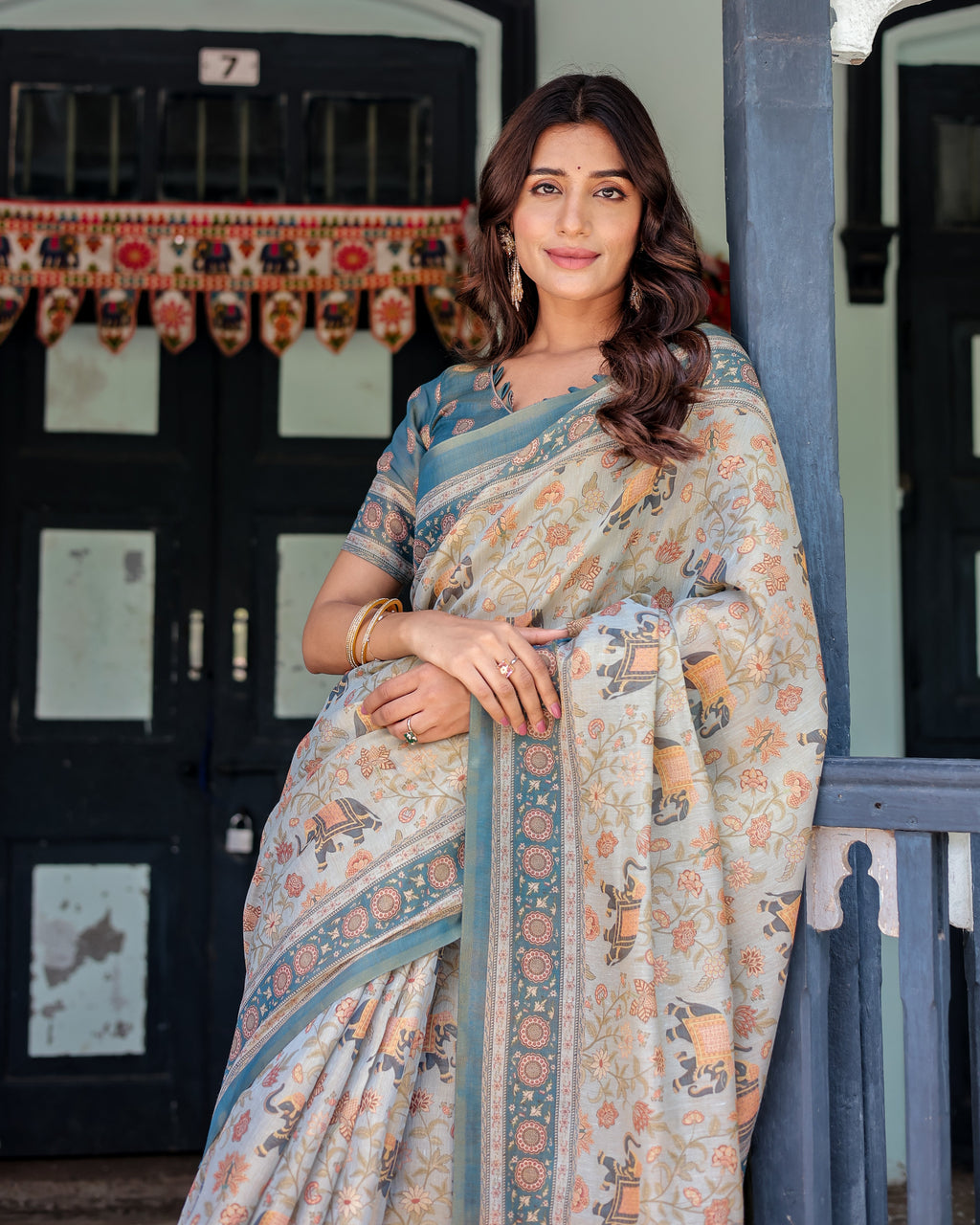 Icy Blue Handloom Cotton Saree with Peach Elephant Motifs & Royal Procession Pallu