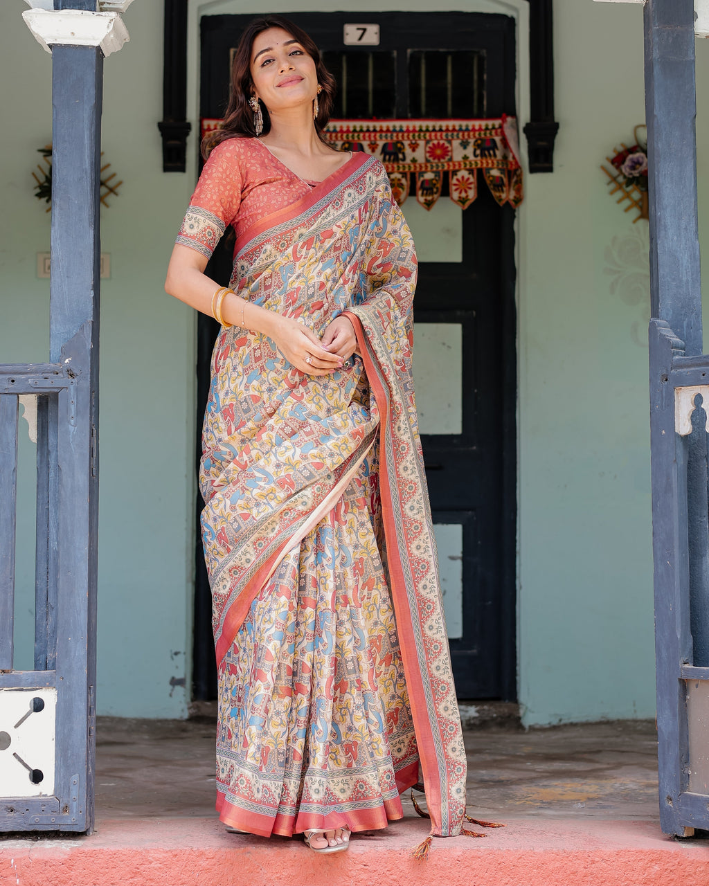 Rust Beige Handloom Cotton Saree with Vibrant Elephant Parade Print & Red Floral Pallu