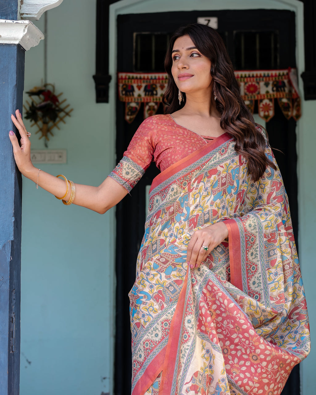 Rust Beige Handloom Cotton Saree with Vibrant Elephant Parade Print & Red Floral Pallu