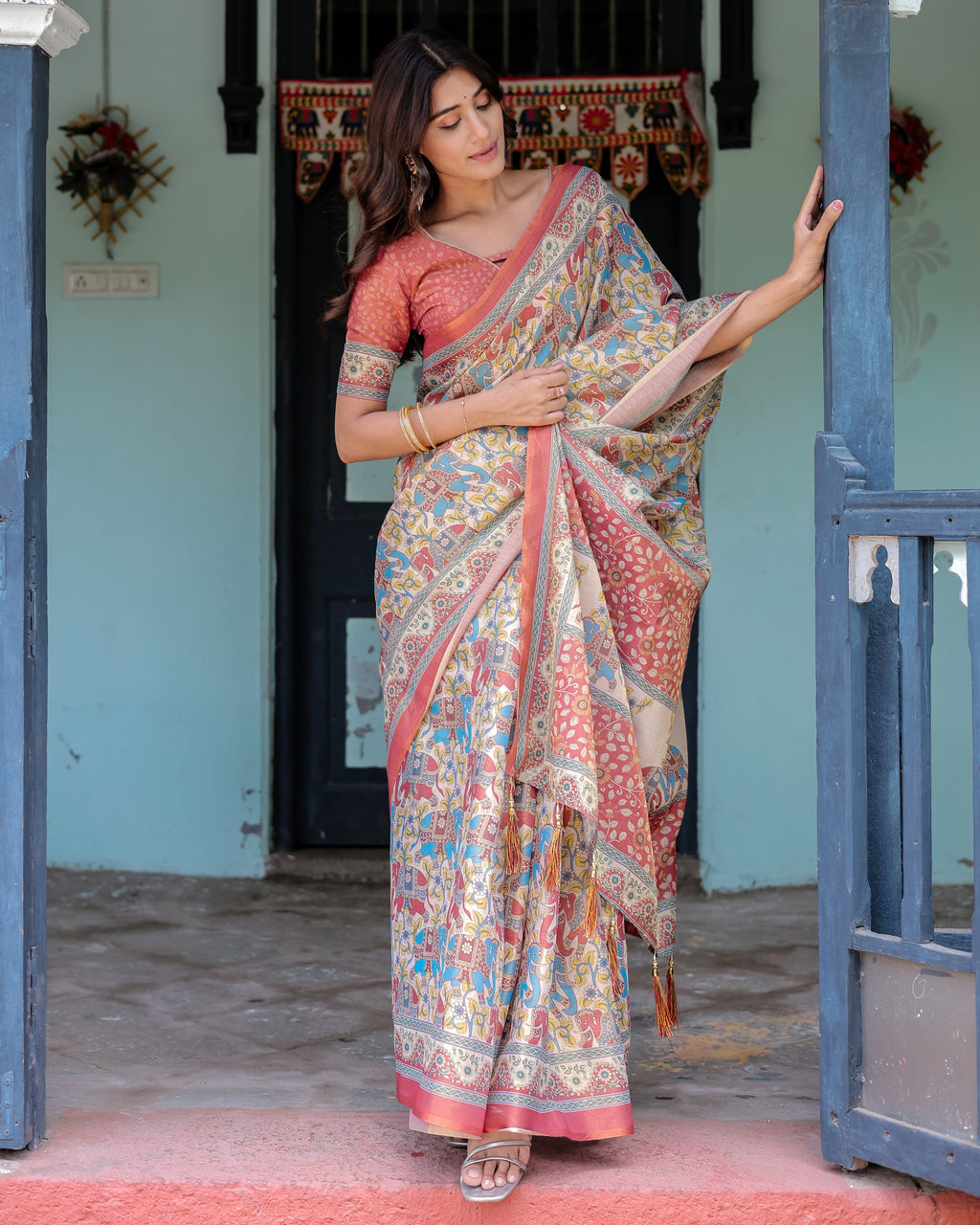 Rust Beige Handloom Cotton Saree with Vibrant Elephant Parade Print & Red Floral Pallu