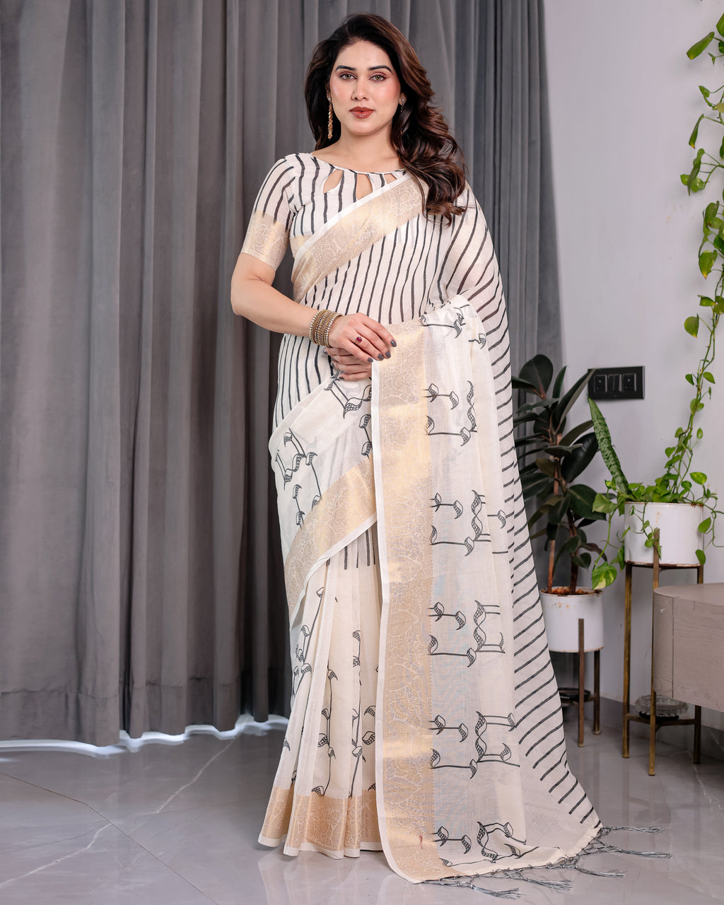 Off-White Handloom Linen Saree with Black Vertical Stripes & Tribal Motifs | Golden Zari Border & Tassel Pallu | Attached Blouse | 5.5m Saree + 0.8m Blouse