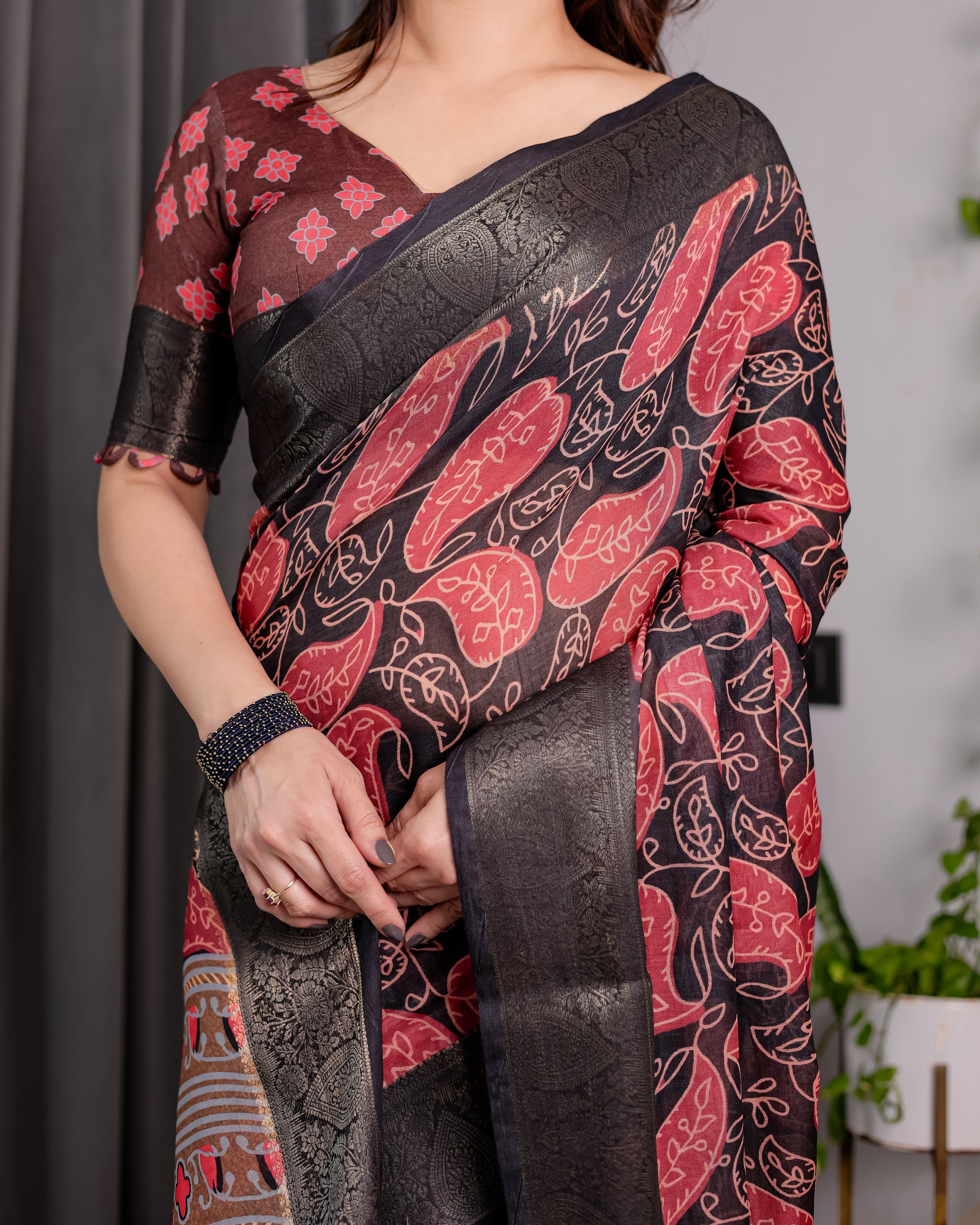Black & Rust Red Handloom Linen Saree with Heart Floral Print & Striped Ethnic Pallu | Antique Zari Border & Tassel Detailing | Attached Blouse | 5.5m Saree + 0.8m Blouse