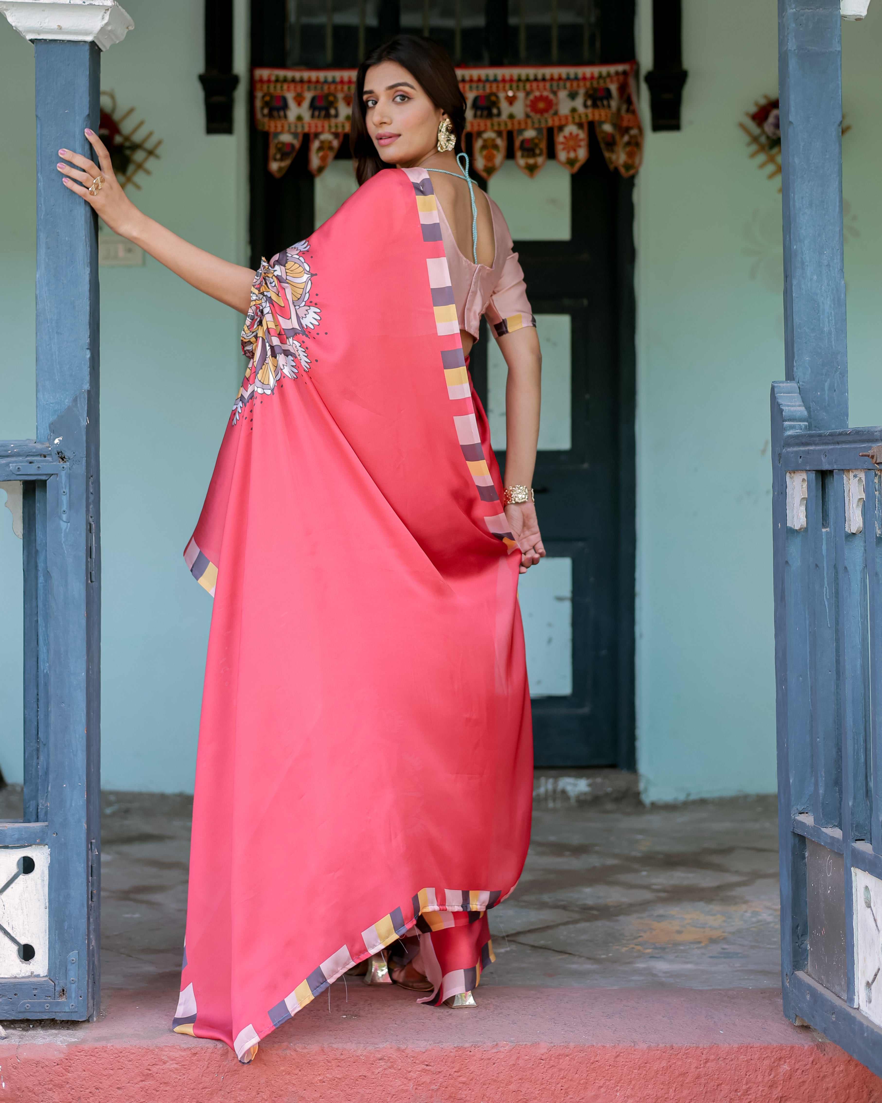 Coral Red Designer Freehand Saree with Mandala Pallu & Multicolor Border | Satin Georgette | Hole-in-the-Pallu Feature