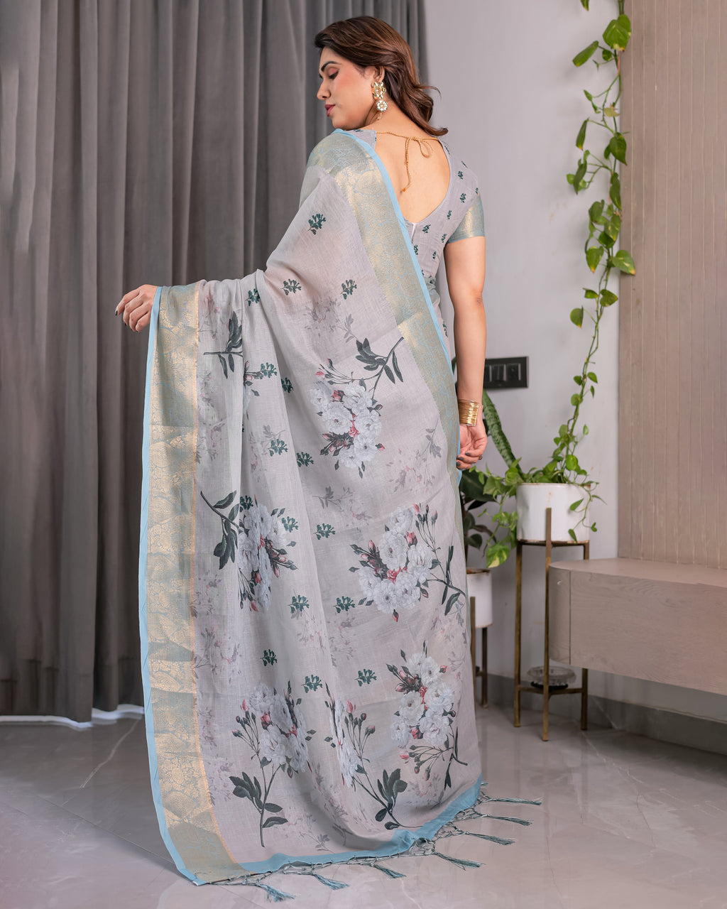 Elegant Ice Grey Handloom Linen Saree with Floral Print, Gold Zari Border & Tassel Detailing | Attached Blouse Piece | 5.5m Saree + 0.8m Blouse