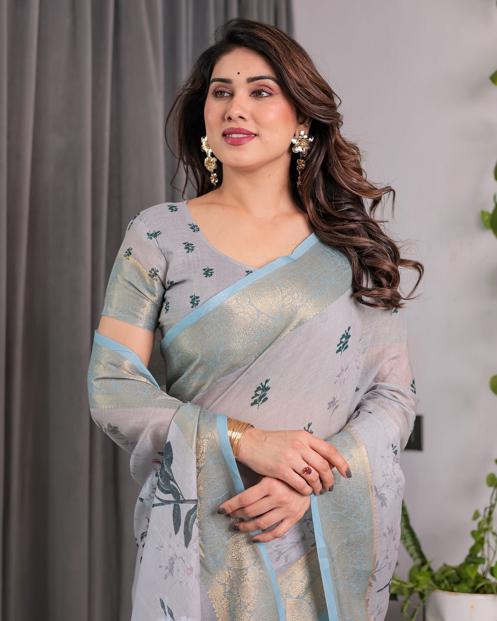 Elegant Ice Grey Handloom Linen Saree with Floral Print, Gold Zari Border & Tassel Detailing | Attached Blouse Piece | 5.5m Saree + 0.8m Blouse