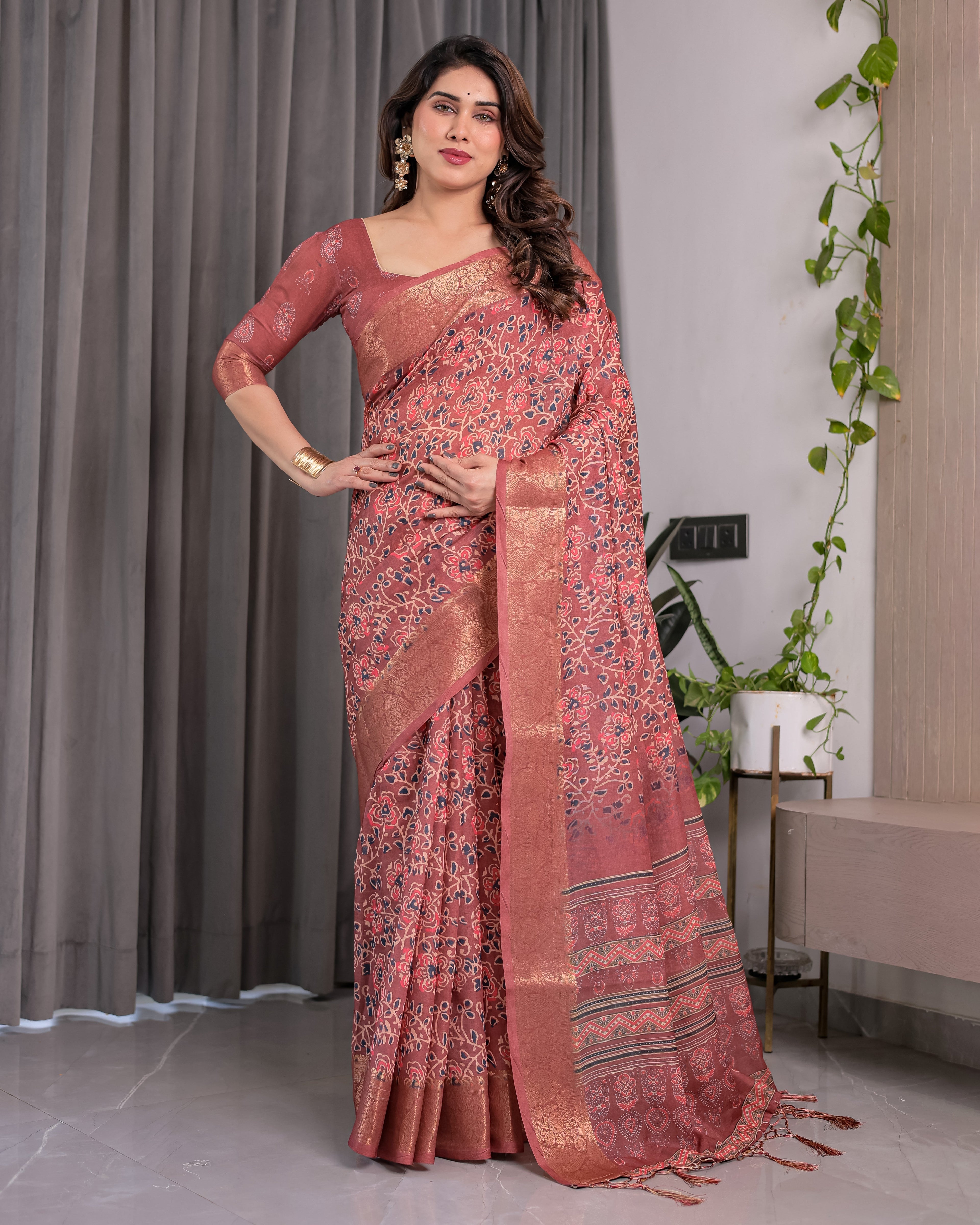 Rust Maroon Handloom Linen Saree with All-Over Floral Print & Ornate Traditional Pallu | Gold Zari Border & Tassel Finish | Attached Blouse | 5.5m Saree + 0.8m Blouse