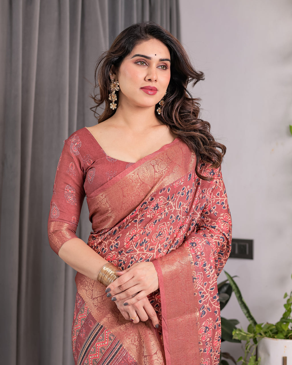 Rust Maroon Handloom Linen Saree with All-Over Floral Print & Ornate Traditional Pallu | Gold Zari Border & Tassel Finish | Attached Blouse | 5.5m Saree + 0.8m Blouse