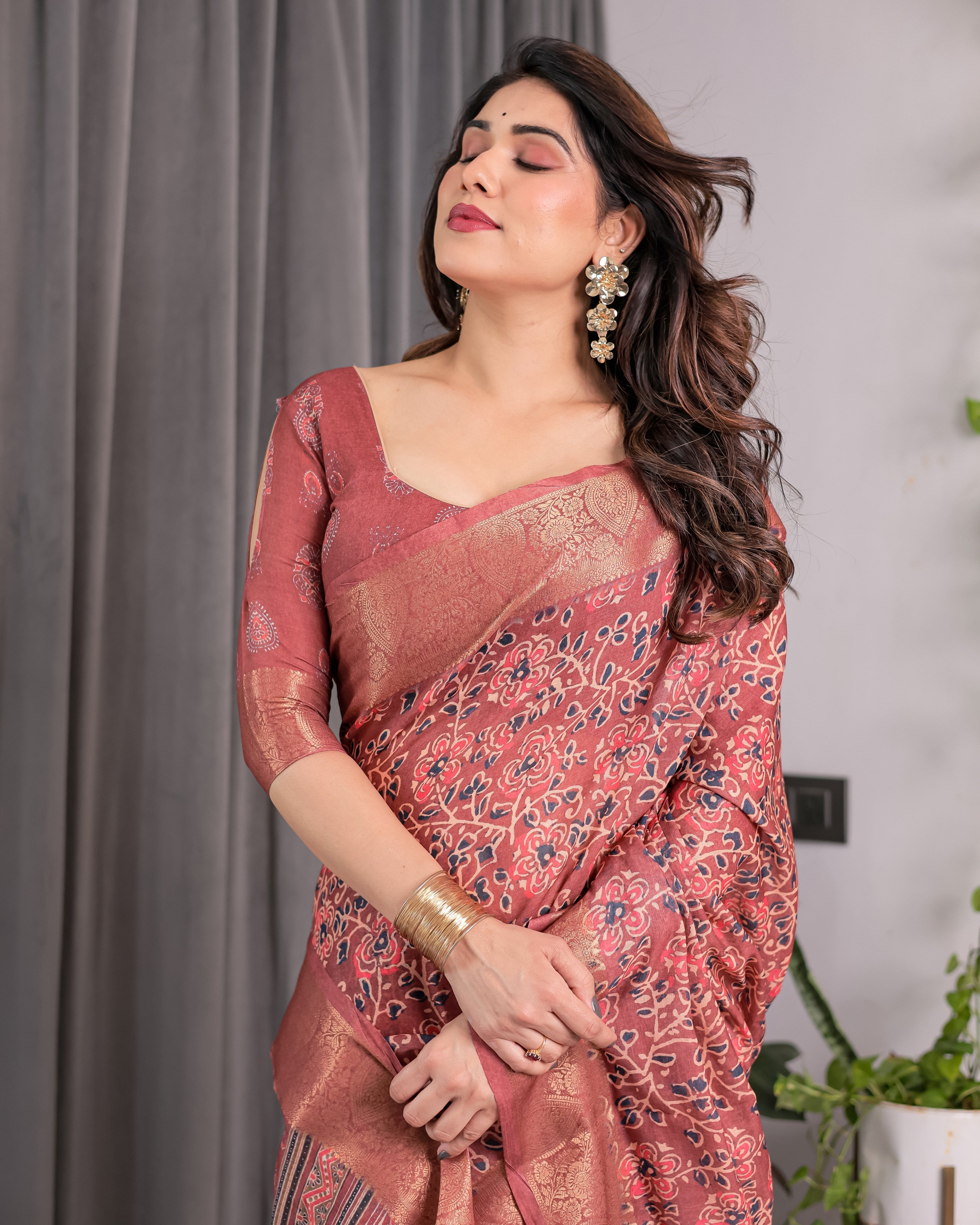 Rust Maroon Handloom Linen Saree with All-Over Floral Print & Ornate Traditional Pallu | Gold Zari Border & Tassel Finish | Attached Blouse | 5.5m Saree + 0.8m Blouse