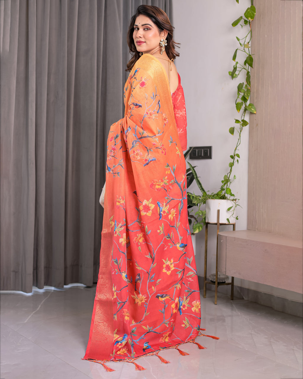 Sunset Orange Handloom Linen Saree with Bluebird & Floral Digital Print | Contrasting Red Pallu & Gold Zari Border | Tassel Detailing | Attached Blouse | 5.5m Saree + 0.8m Blouse