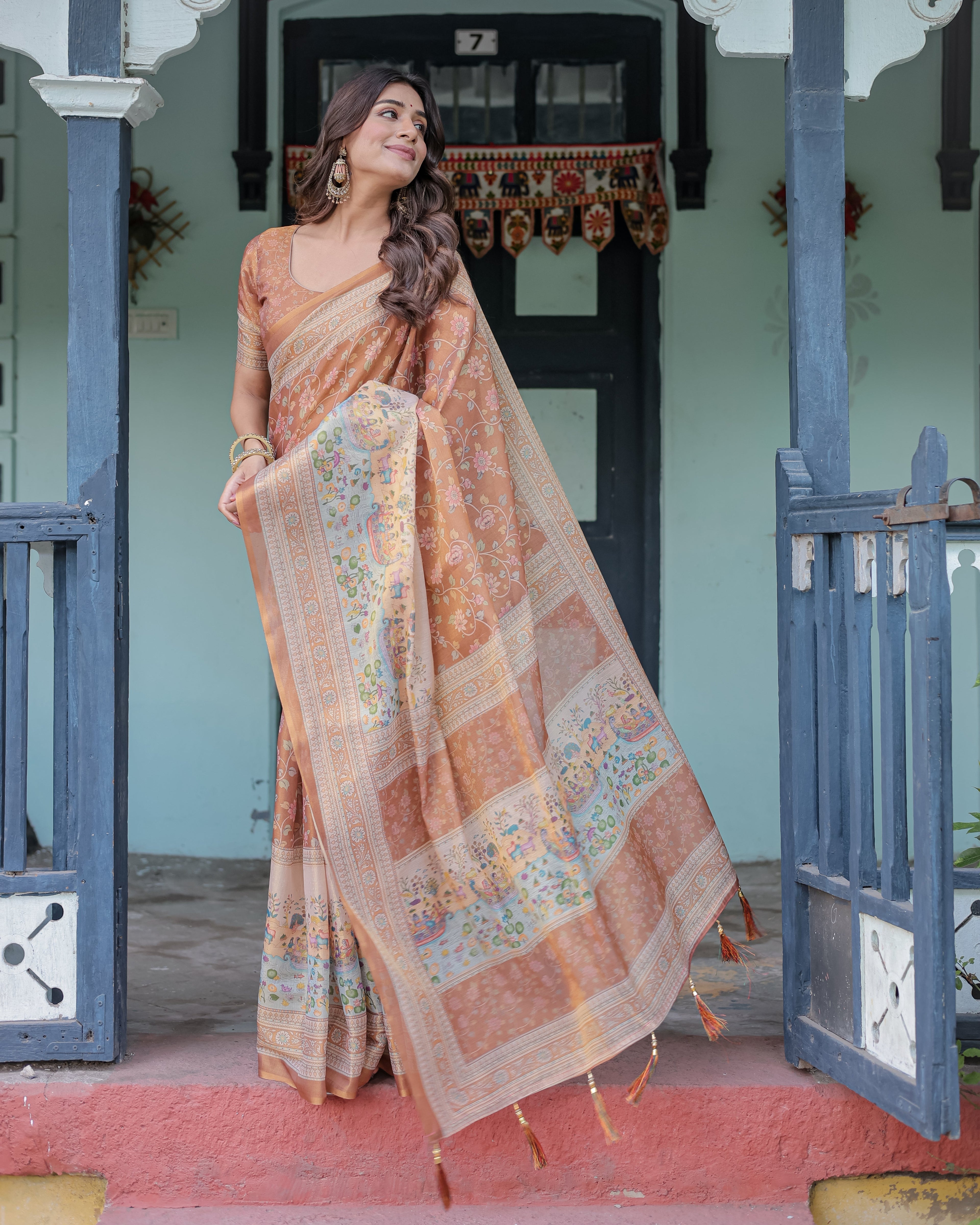 Burnt Peach Handloom Cotton Saree with Floral Buta Design & Village Scene Pallu