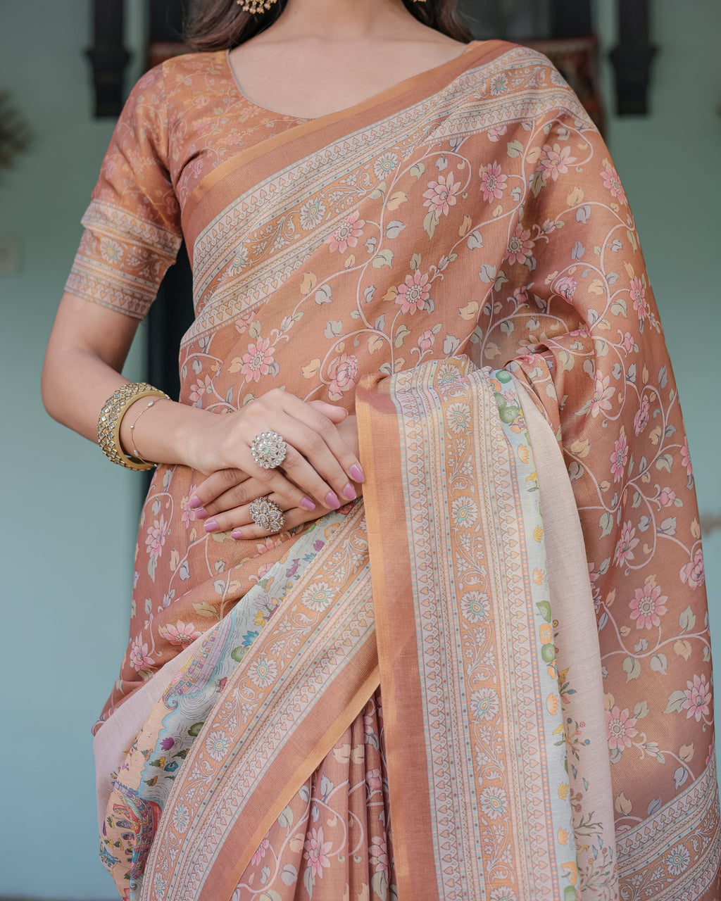 Burnt Peach Handloom Cotton Saree with Floral Buta Design & Village Scene Pallu