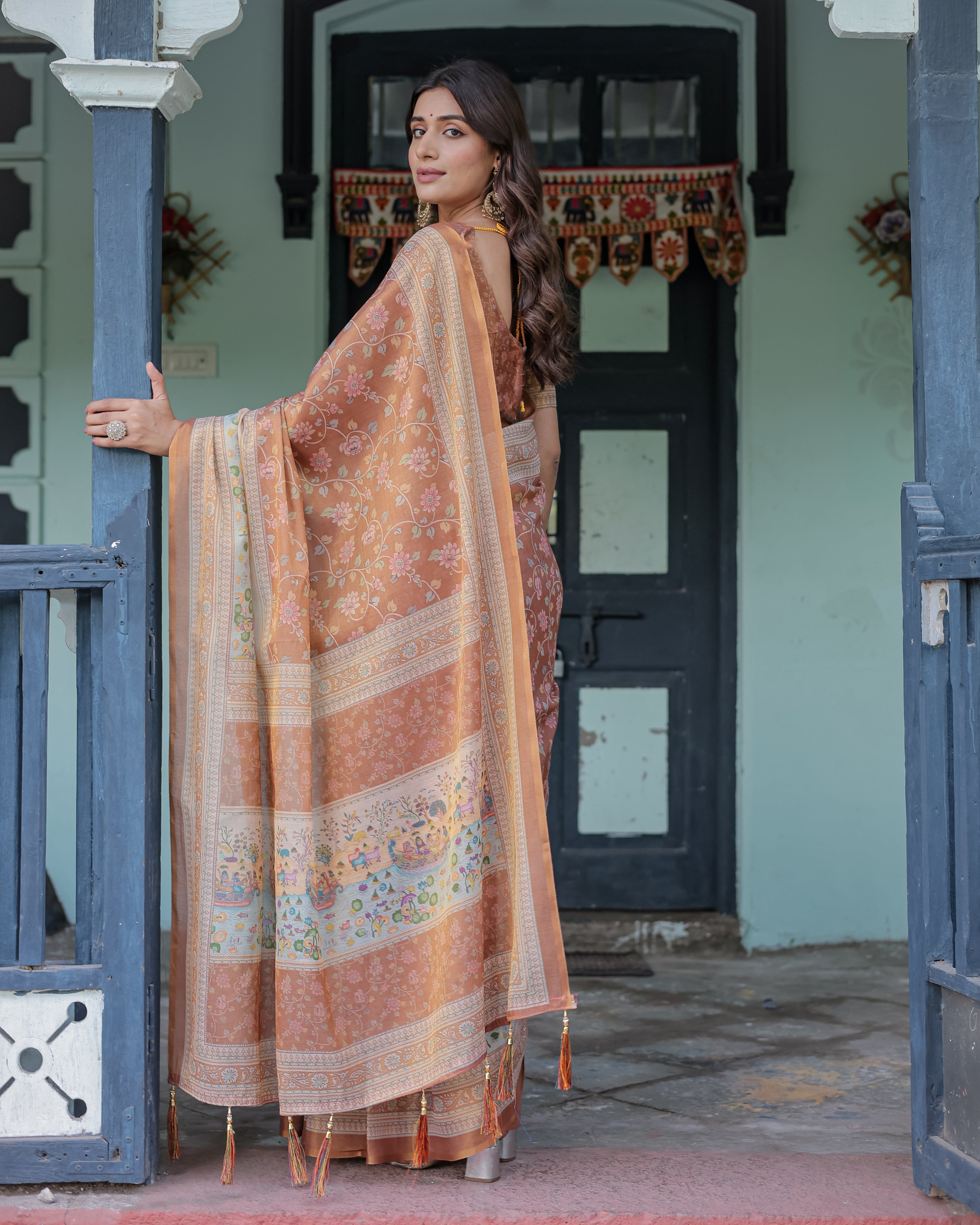 Burnt Peach Handloom Cotton Saree with Floral Buta Design & Village Scene Pallu